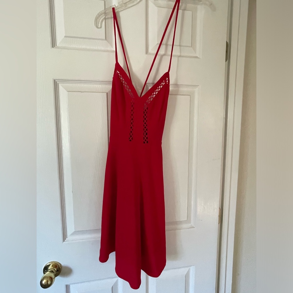 Cute red dress. Size 4/small. Worn once, good condition.